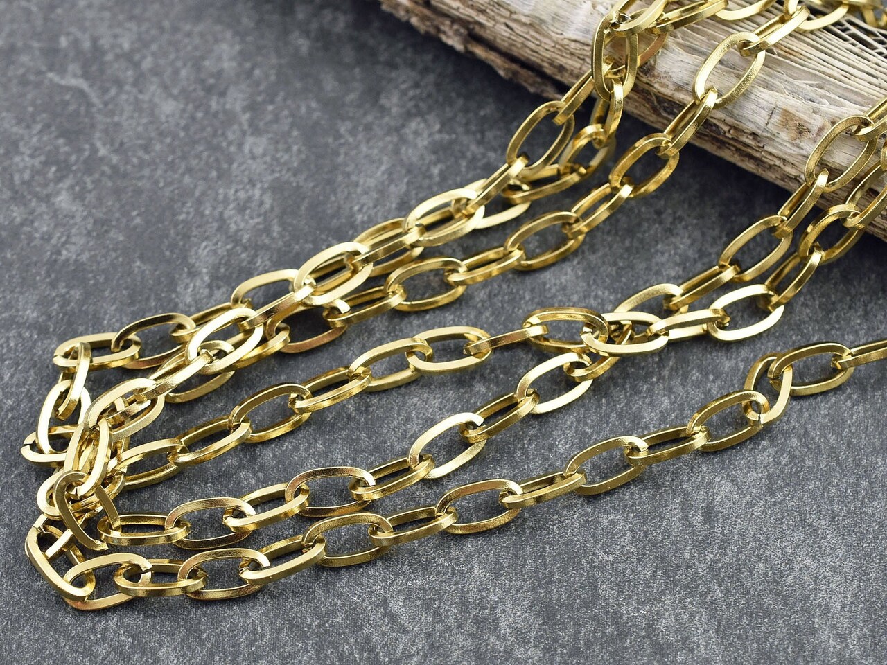 18K Gold Plated 304 Stainless Steel Unwelded Paperclip Chain -- Sold by the Foot